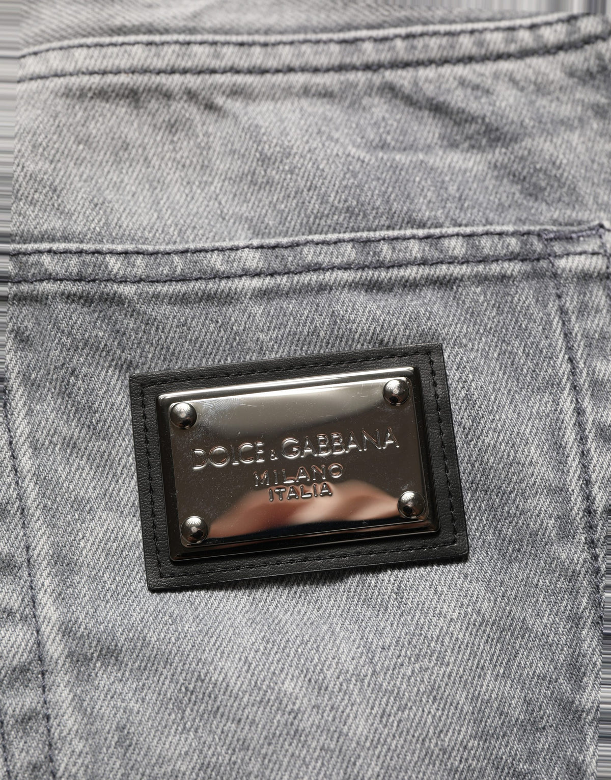 Jeans by Dolce & Gabbana for men in denim cotton gray & signature presents a tailored silhouette, showcasing a tailored straight-leg and long cut with a refined for a truly tailored aesthetic.