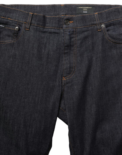Jeans by Dolce & Gabbana for men in stretch denim cotton dark-gray & signature presents a tailored silhouette, showcasing a tailored skinny & slim and long cut with a refined for a truly tailored aesthetic.