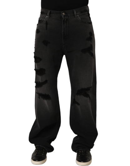 Jeans by Dolce & Gabbana for men in distressed cotton denim dark-gray & signature presents a tailored silhouette, showcasing a tailored flared, relaxed-fit, wide & oversized and long cut with a refined for a truly tailored aesthetic.
