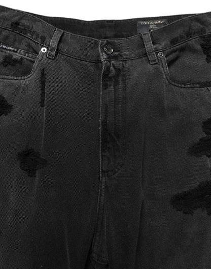 Jeans by Dolce & Gabbana for men in distressed cotton denim dark-gray & signature features an sartorial flared, relaxed-fit, wide & oversized and long with a cut for a sartorial finish.