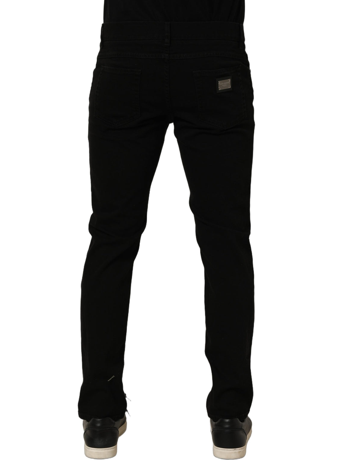Jeans by Dolce & Gabbana for men in stretch denim cotton black & signature presents a tailored silhouette, showcasing a tailored skinny & regular-fit and long cut with a refined mid rise for a truly tailored aesthetic.