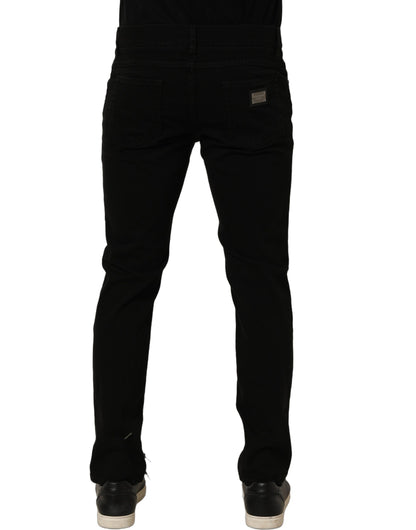 Jeans by Dolce & Gabbana for men in stretch denim cotton black & signature presents a tailored silhouette, showcasing a tailored skinny & regular-fit and long cut with a refined mid rise for a truly tailored aesthetic.