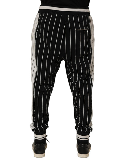 Jogger Sweatpants by Dolce & Gabbana for men in cotton black, white, pinstripe & striped features an kinetic and long with a , showcasing high-performance for an kinetic look.