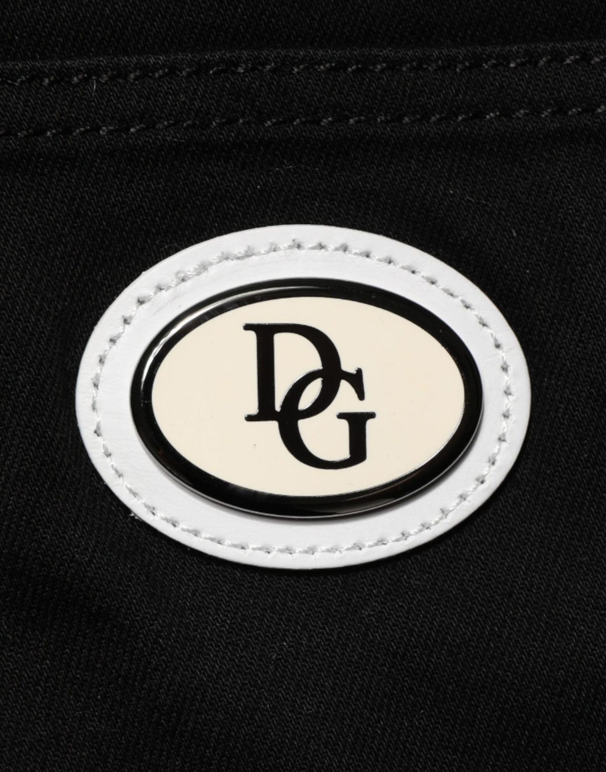 Jeans by Dolce & Gabbana for men in stretch denim cotton black, white, signature & striped features an sophisticated and skinny with a precise long, creating a sophisticated and sophisticated silhouette.
