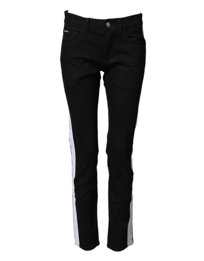 Jeans by Dolce & Gabbana for men in stretch denim cotton black, white, signature & striped presents a tailored silhouette, showcasing a tailored skinny and long cut with a refined for a truly tailored aesthetic.
