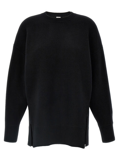 Cardigan by TOTEME for women in wool & polyester black features a nuanced silhouette with a refined crew neckline and nuanced long-sleeve detailing for a sophisticated look.