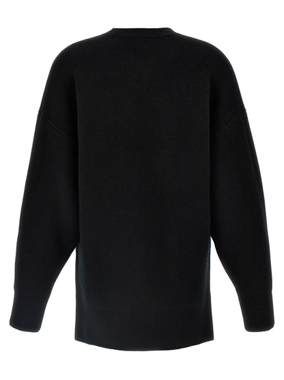 Cardigan by TOTEME for women in wool & polyester black presents a textural silhouette, artfully finished with a textural crew neckline and for a sophisticated, textural look.