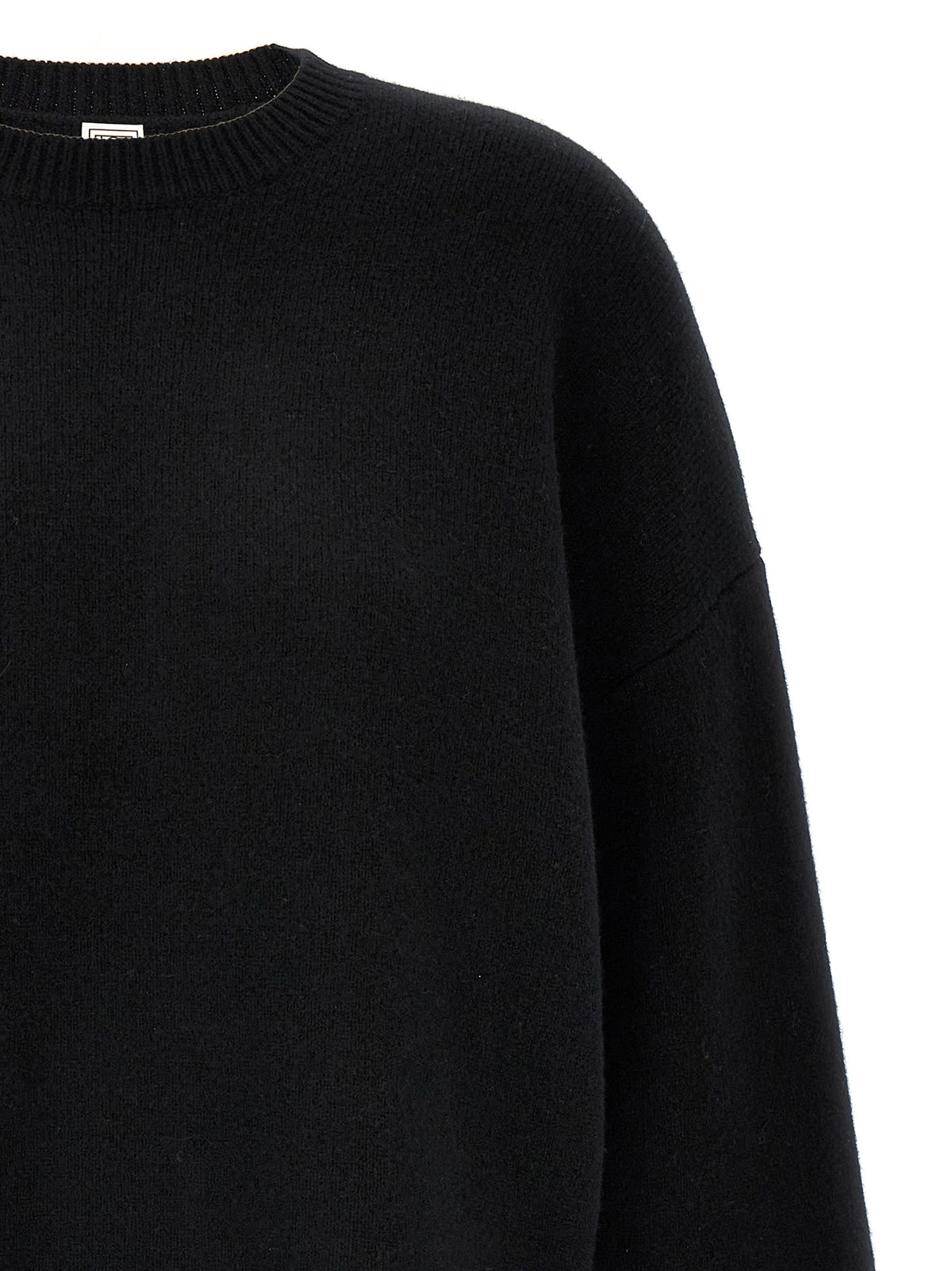 Cardigan by TOTEME for women in wool & polyester black showcases a captivating silhouette, artfully detailed with a captivating and crew neckline for a truly sophisticated captivating look.