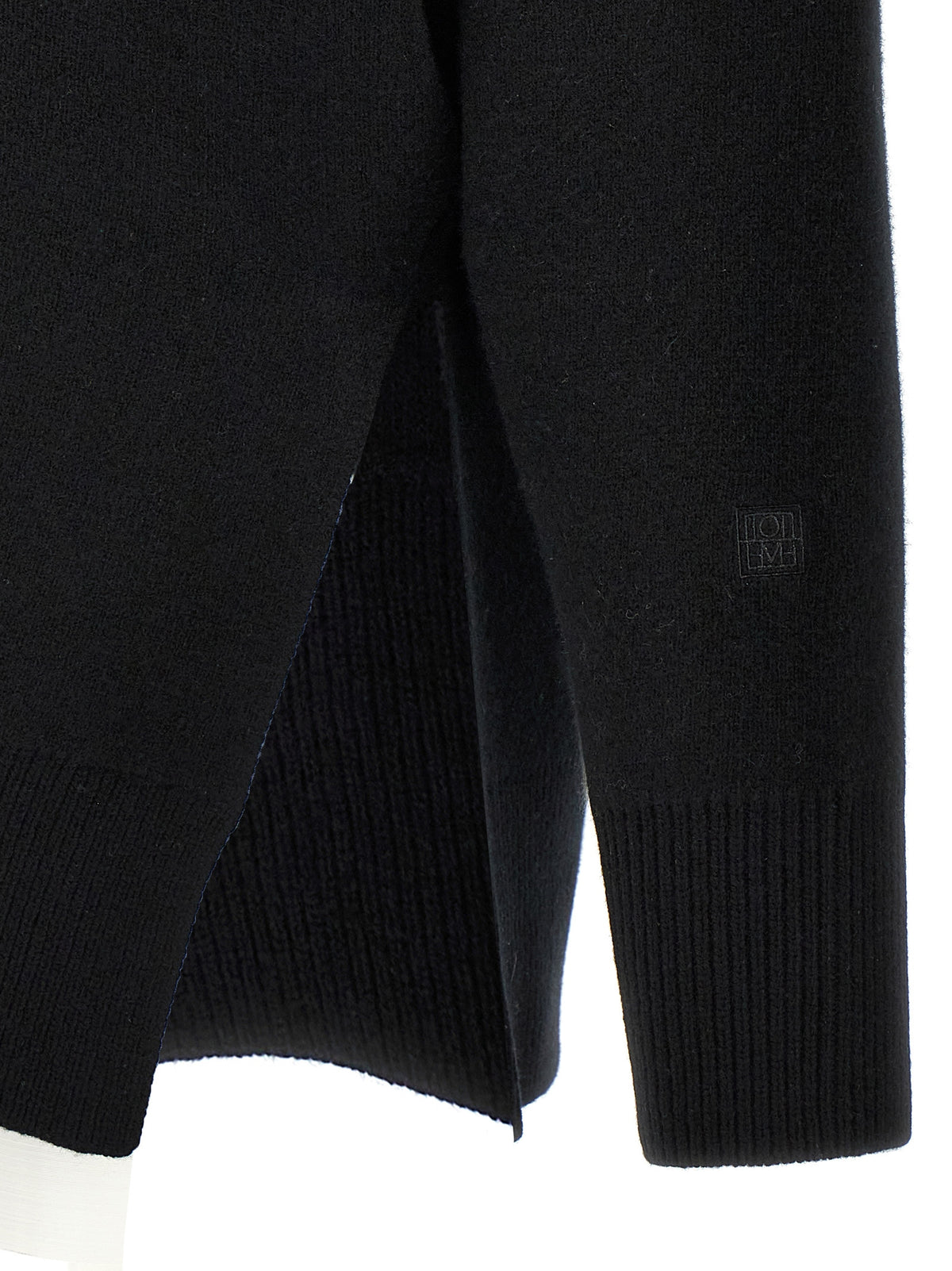 Cardigan by TOTEME for women in wool & polyester black features an crisp silhouette, showcasing a sophisticated and detail for a truly crisp finish.