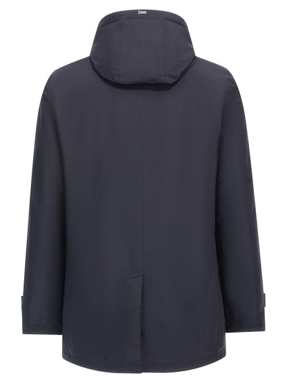 Hooded Parka by Herno for men in polyester nylon & goose-down blue features an avant garde silhouette, showcasing refined water-resistant, windproof, hooded & insulated and a sophisticated hooded shirt-collar neckline for a polished look.