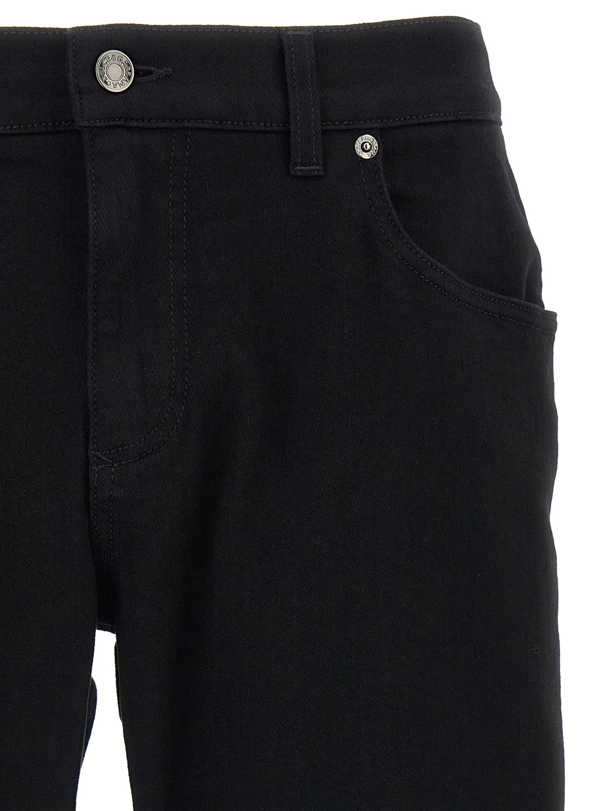 Jeans by Dolce & Gabbana for men in stretch denim cotton black presents a tailored silhouette, showcasing a tailored slim and long cut with a refined for a truly tailored aesthetic.
