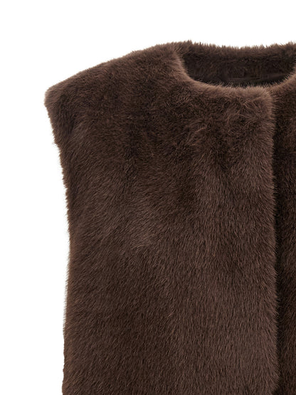 Vest by Herno for women in polyester beaver hair & fur brown features a stylish silhouette, showcasing distinct pockets and a refined round neckline for a truly stylish finish.