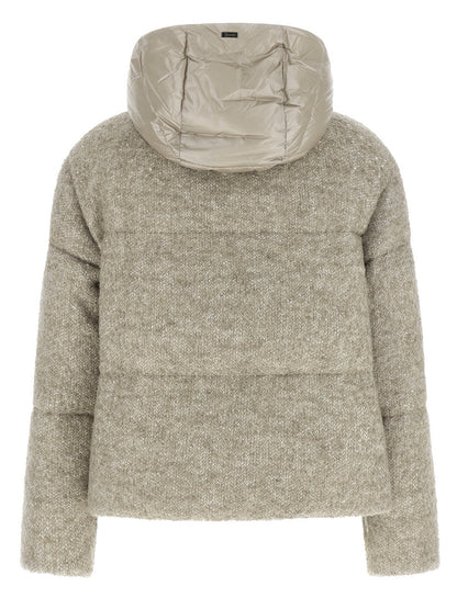 Hooded Overcoat by Herno for women in polyester viscose sequins & alpaca wool beige showcases a enveloping silhouette, detailed with distinctive hooded & insulated and a enveloping hooded neckline.
