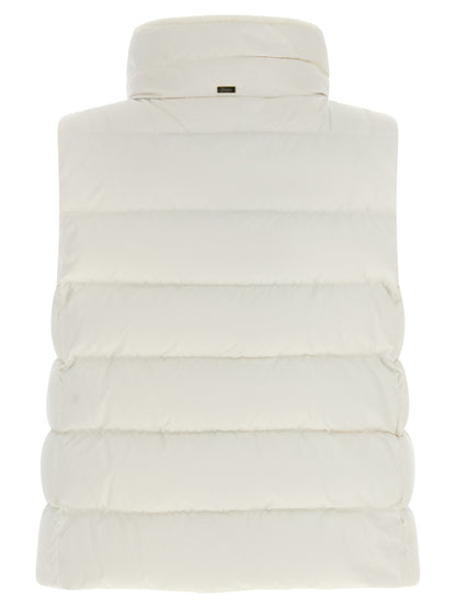 Vest by Herno for women in polyester satin gold, white & signature features a enviable silhouette, elegantly detailed with a enviable and functional pockets & insulated for a enviable finish.