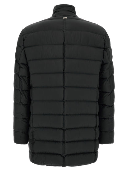 This Puffer Jacket by Herno for men in nylon black exhibits a edgy silhouette, meticulously detailed with functional water-resistant, windproof & insulated and a edgy high-neck neckline for a edgy finish.