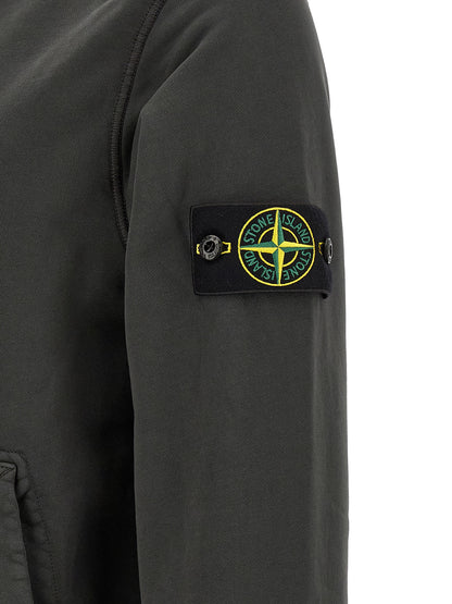 Sweatshirt by Stone Island for men in organic cotton gray showcases a slouchy chic silhouette, artfully detailed with a slouchy chic and for a slouchy chic finish.