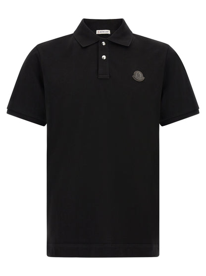 Polo Shirt by Moncler for men in leather & cotton black presents a crisp silhouette, artfully detailed with a crisp and crisp .