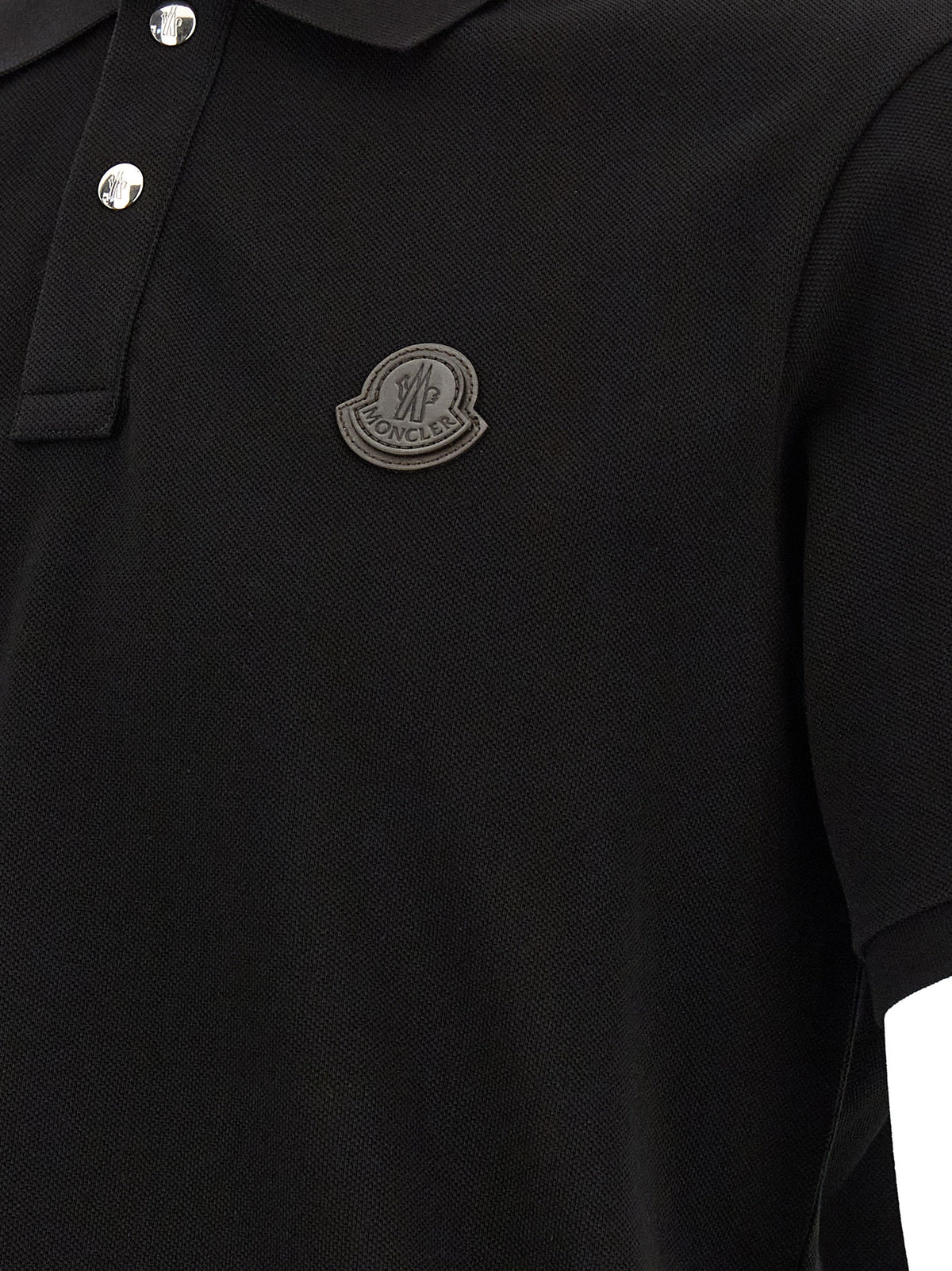 Polo Shirt by Moncler for men in leather & cotton black showcases a enviable silhouette, featuring a refined and for a enviable finish.