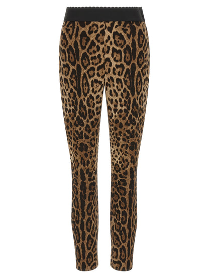Activewear Leggings by Dolce & Gabbana for women in stretch viscose animal, black, brown & print features an versatile silhouette, showcasing with a versatile wide & leggings, long, and high rise for a high-performance look.