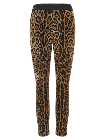 Activewear Leggings by Dolce & Gabbana for women in stretch viscose animal, black, brown & print features an streamlined wide & leggings and high rise with a long cut, beautifully enhanced by performance-driven .