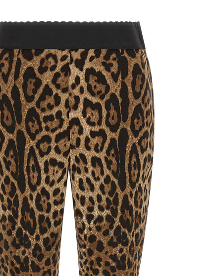 Activewear Leggings by Dolce & Gabbana for women in stretch viscose animal, black, brown & print features an ergonomic wide & leggings with , highlighting a ergonomic high rise and long for a premium, high-performance look.