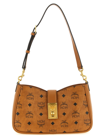 Shoulder Bag by MCM for women in polyester polyurethane cotton & suede leather brown, gold & monogram presents a versatile silhouette, showcasing a secure zipper & turn-lock and versatile with versatile shoulder-strap & adjustable-strap for a sophisticated look.