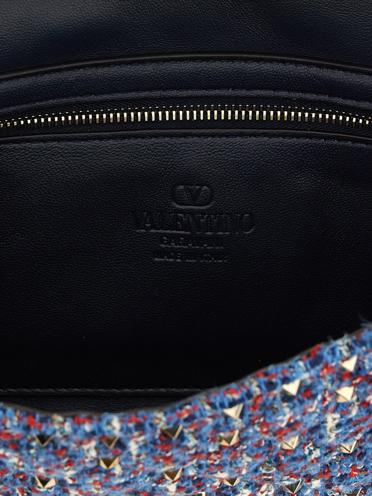 2-in-1 Shoulder & Crossbody Handbag by Valentino Garavani for women in cotton tweed leather & virgin wool blue features an versatile silhouette, showcasing a secure zipper and versatile with versatile crossbody-strap & shoulder-strap for a versatile finish.