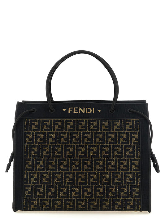 This Shopper Tote Bag by Fendi for women in cotton polyamide & polyurethane black, brown & patterned features an on trend Cotton Polyamide & Polyurethane Shopper Tote Bag design with a secure , ample , and on trend handle.