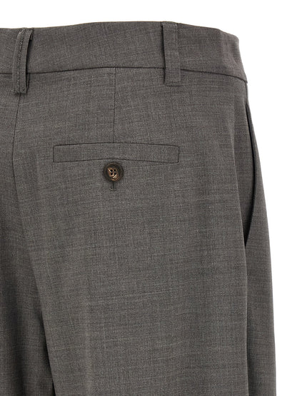 Trousers by Brunello Cucinelli for women in virgin wool & polyamide gray features a sculptural silhouette, showcasing a sculptural wide & cropped and cropped with a sophisticated for a sculptural finish.