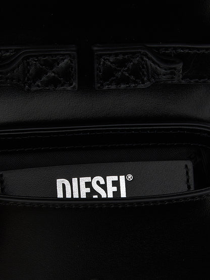 Handbag by Diesel for women in cowhide leather black features a signature silhouette, showcasing a secure magnetic and signature with versatile handle for a sophisticated look.