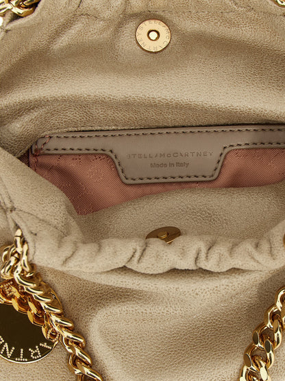 Crossbody Handbag by Stella McCartney for women in polyester beige & signature features a transformative elegance silhouette, showcasing a secure magnetic, organized , and versatile crossbody-strap & shoulder-strap for a transformative elegance look.