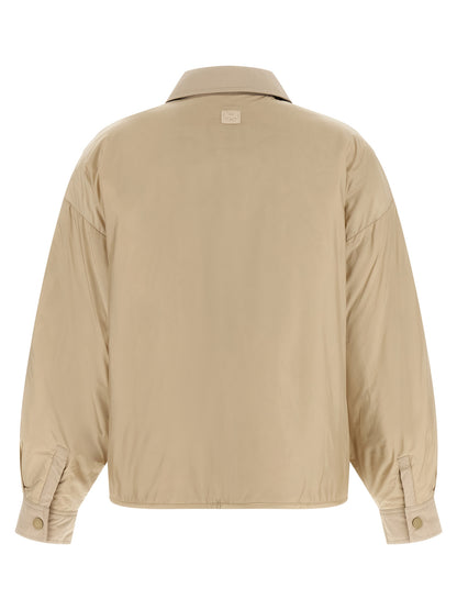 Overcoat by Max Mara for women in polyester canvas beige showcases a enveloping silhouette, detailed with distinctive pockets & insulated and a enveloping shirt-collar neckline.