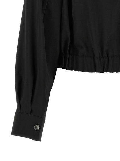 Overcoat by Max Mara for women in virgin wool black features a contemporary silhouette showcasing a contemporary and refined pockets for a sophisticated finish.