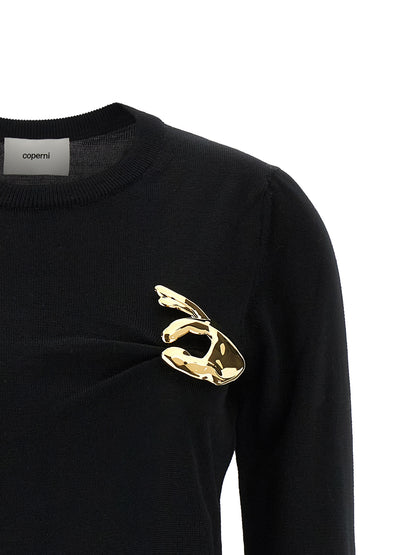 Cardigan by Coperni for women in virgin wool black & gold features an crisp silhouette, showcasing a sophisticated crew neckline and detail for a truly crisp finish.
