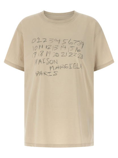 T-Shirt by Maison Margiela for women in cotton beige, signature & print features an on trend silhouette, perfectly showcasing a on trend short-sleeve and for an elevated aesthetic.