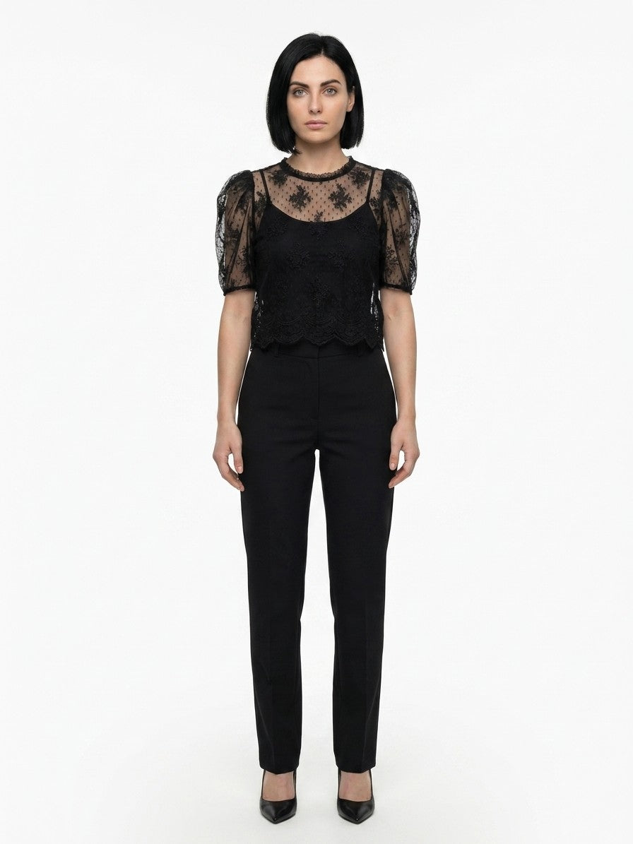 Blouse by Dolce & Gabbana for women in nylon cotton polyester black showcases a sublime silhouette, artfully detailed with a sublime and for a sophisticated, sublime finish.
