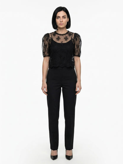 Blouse by Dolce & Gabbana for women in nylon cotton polyester black showcases a sublime silhouette, artfully detailed with a sublime and for a sophisticated, sublime finish.