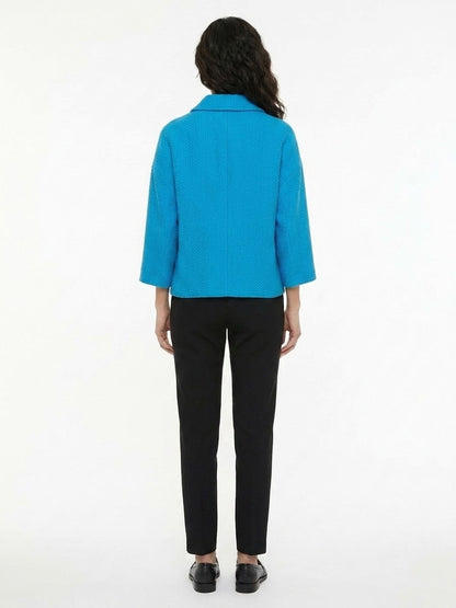 Windbreaker Jacket by Dolce & Gabbana for women in stretch polyester cotton turquoise showcases a modern silhouette, integrating windproof and a modern for a sophisticated finish.