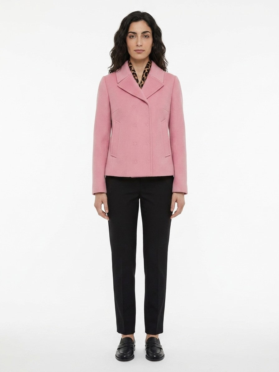 Jacket by Dolce & Gabbana for women in marabou polyester & wool pink presents a impeccable silhouette, showcasing distinct and a impeccable for a sophisticated finish.