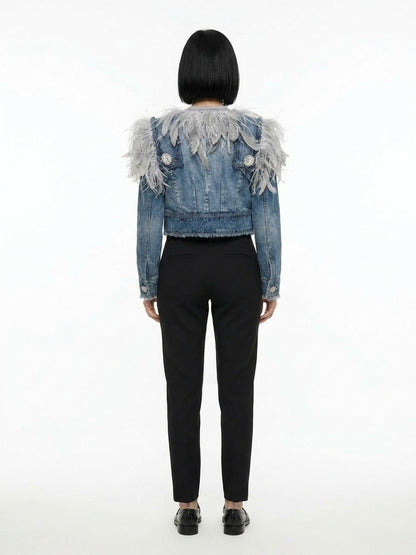 Trucker Jacket by Dolce & Gabbana for women in cotton denim feathers & ostrich leather blue features a city-ready silhouette, detailed with and a city-ready .