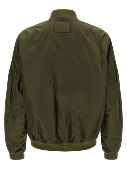 Bomber Jacket by Balenciaga for men in polyamide bicolour, green & olive presents a effortlessly chic silhouette, showcasing a sophisticated and premium pockets for a truly effortlessly chic finish.