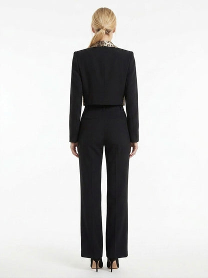Blazer by Dolce & Gabbana for women in wool silk & viscose black features an crisp silhouette with sophisticated and a crisp for a truly crisp finish.