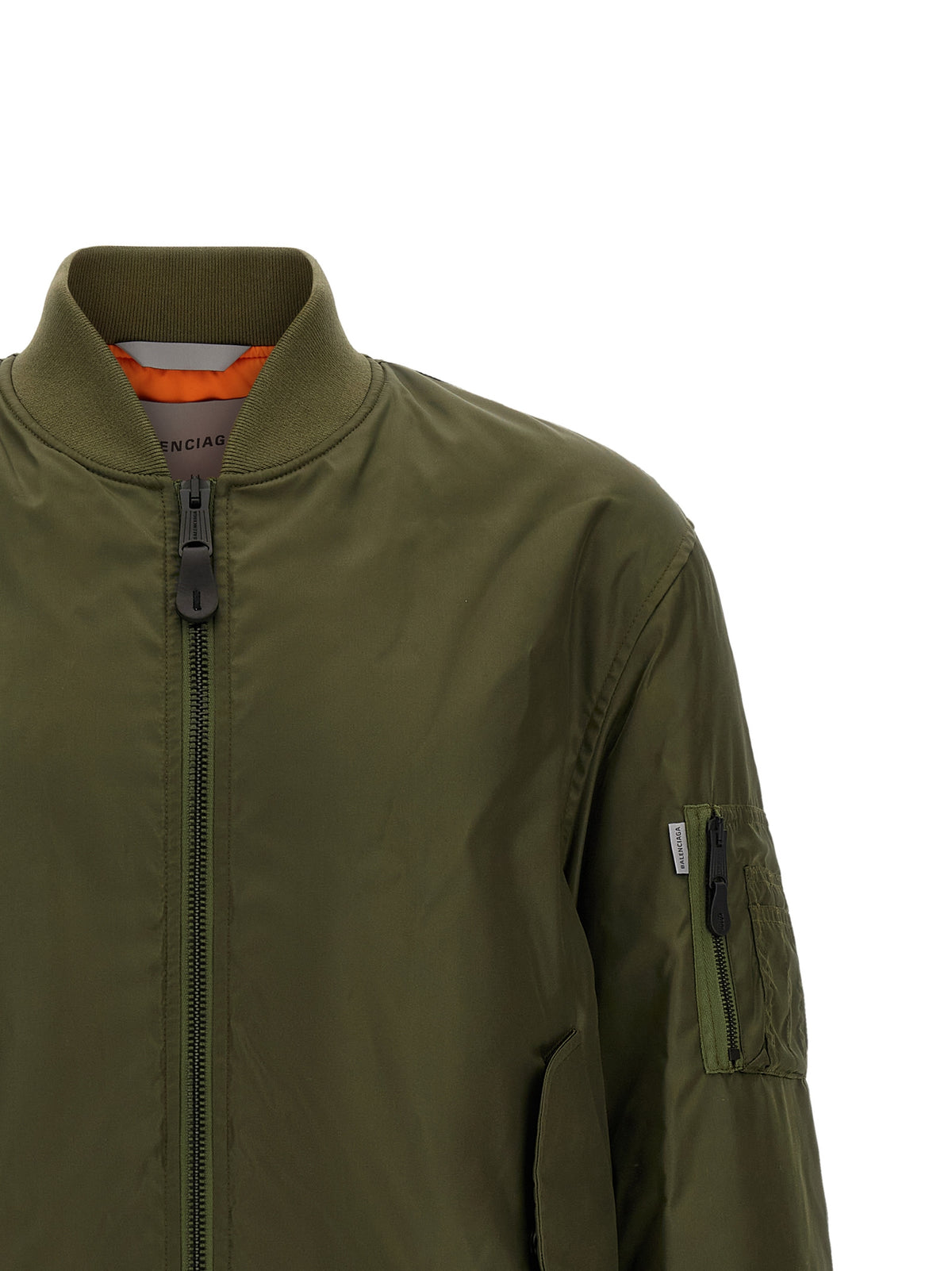 This Bomber Jacket by Balenciaga for men in polyamide bicolour, green & olive exhibits a edgy silhouette, meticulously detailed with functional pockets and a edgy for a edgy finish.