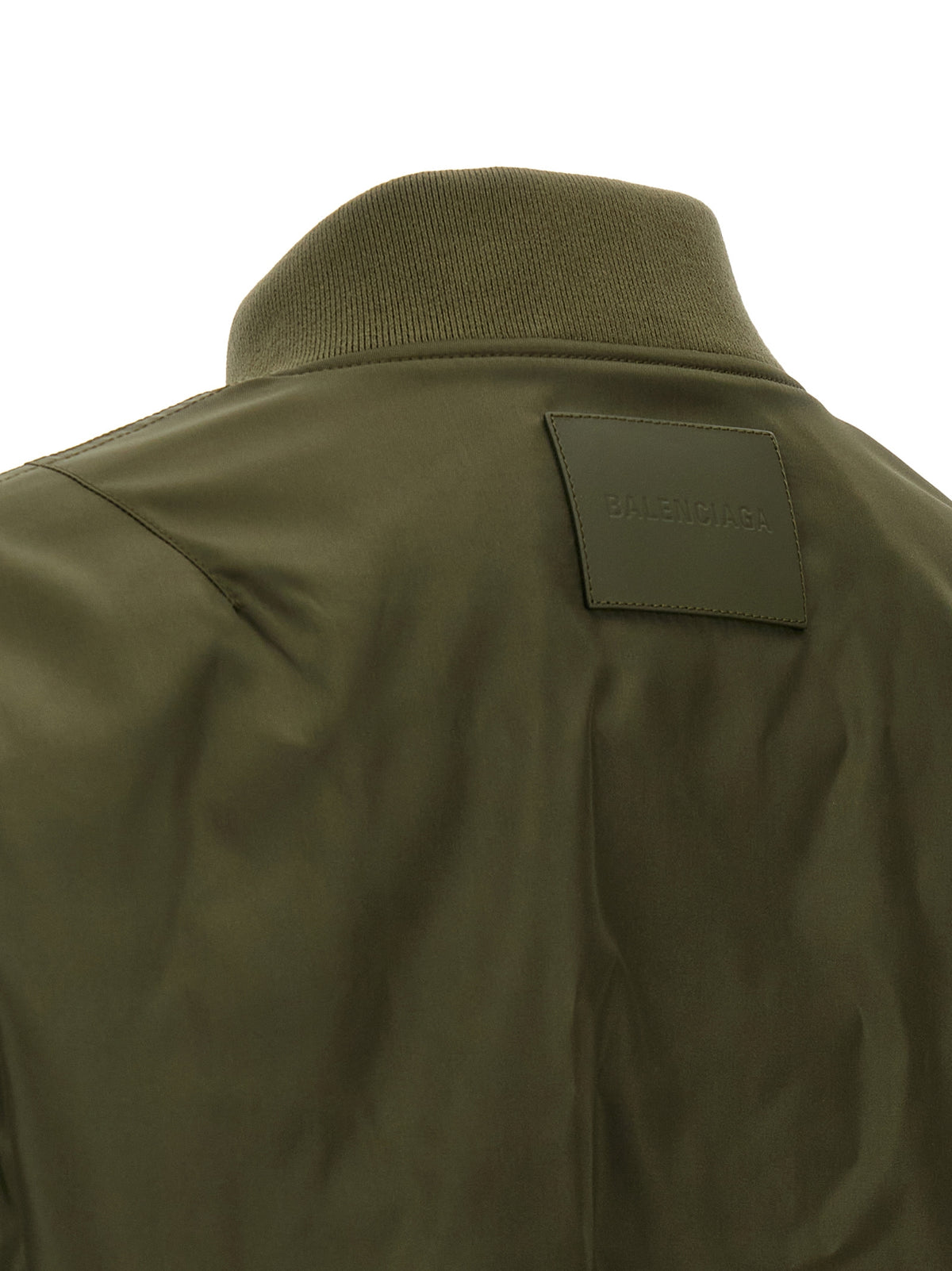 Bomber Jacket by Balenciaga for men in polyamide bicolour, green & olive features an contemporary silhouette, showcasing a sophisticated and contemporary pockets for a truly refined look.