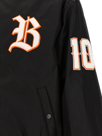 Bomber Jacket by Balenciaga for men in polyamide twill black, orange, white & signature features a city-ready silhouette, detailed with and a city-ready .