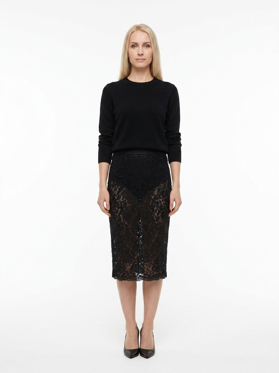 Skirt by Dolce & Gabbana for women in polyamide black features a sublime silhouette, showcasing the sublime design of the Women's Polyamide Midi Skirt in a sophisticated midi.