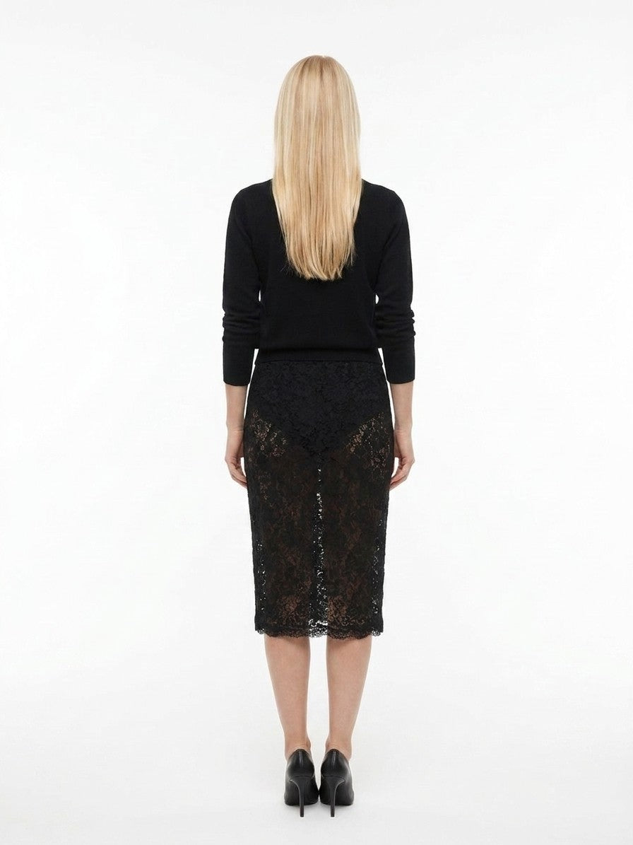 Skirt by Dolce & Gabbana for women in polyamide black features a contoured silhouette from the Women's Polyamide Midi Skirt collection, characterized by its contoured midi for a contoured finish.