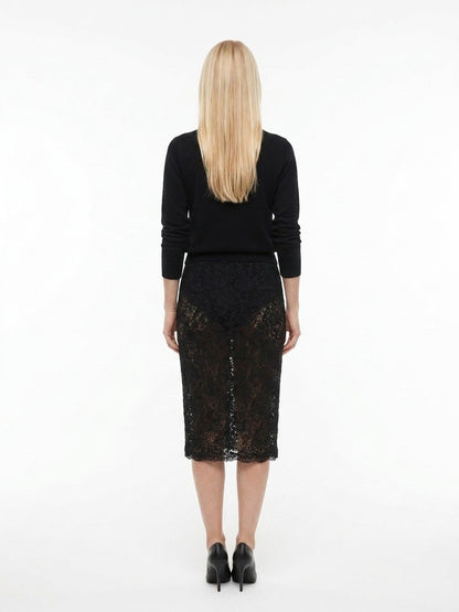 Skirt by Dolce & Gabbana for women in polyamide black features a contoured silhouette from the Women's Polyamide Midi Skirt collection, characterized by its contoured midi for a contoured finish.