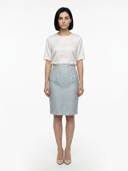 Skirt by Dolce & Gabbana for women in polyester cotton nylon & silk light-blue showcases a dramatic silhouette, artfully capturing the essence of the Women's Polyester Cotton Nylon & Silk Midi Skirt in a dramatic midi cut for a refined look.