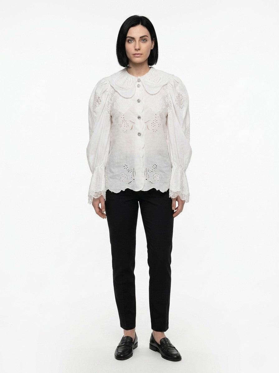 Blouse by Dolce & Gabbana for women in cotton linen & polyester white presents a discerning silhouette, showcasing a sophisticated and for a truly discerning finish.